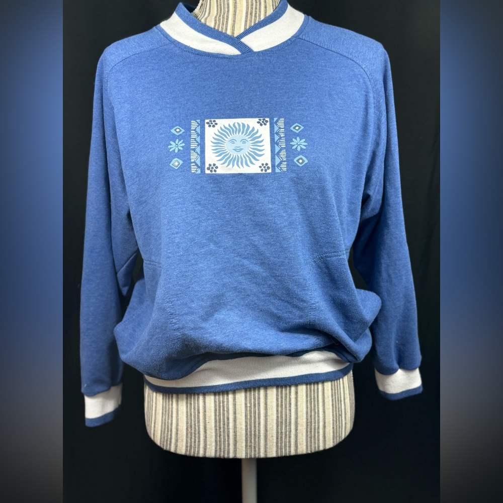 Adorable blue Jantzen vintage pullover sweatshirt with celestial logo on front